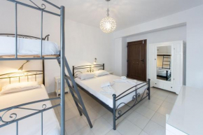 Naxos City Center Room | Economy Quadruple Room| Private Balcony | City Views | Saint George